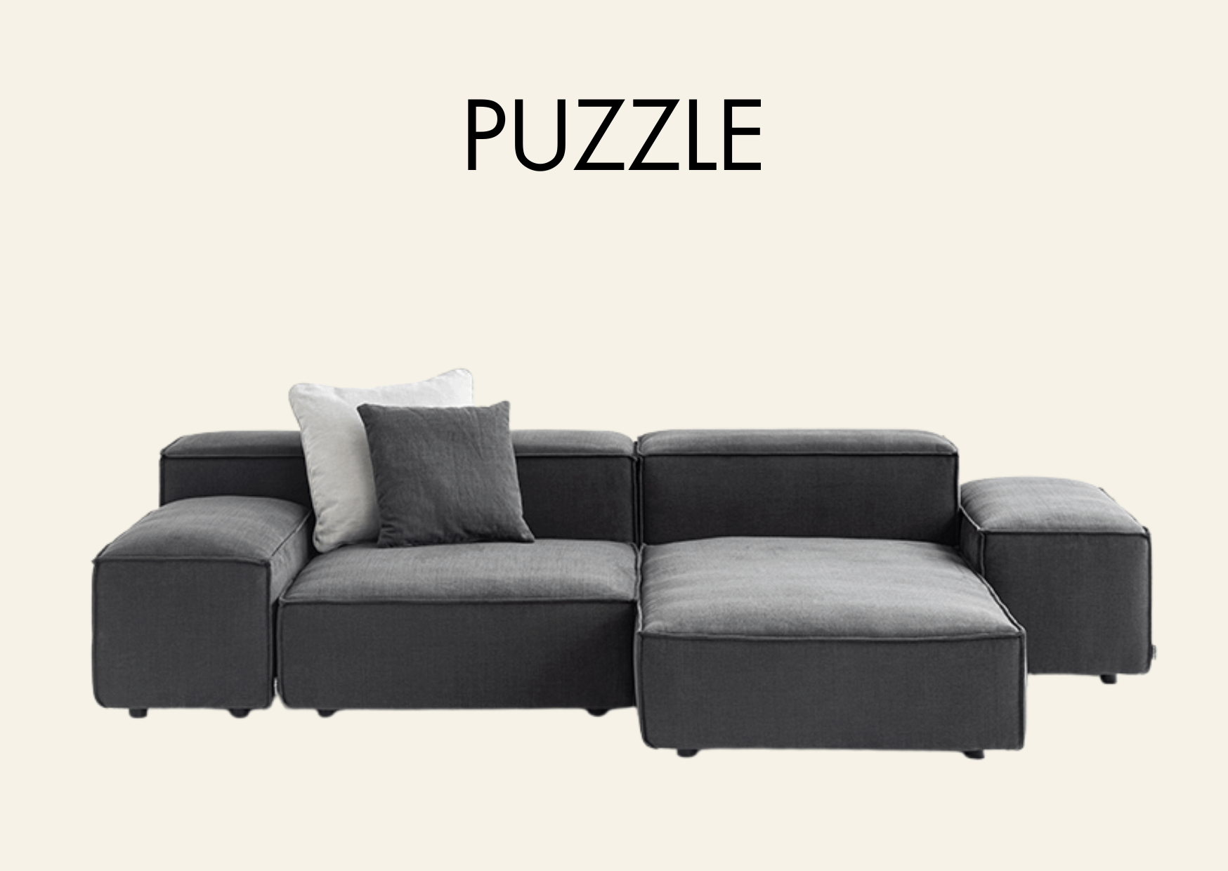 dunkelgraue Couch mit Aufschrift "Puzzle"